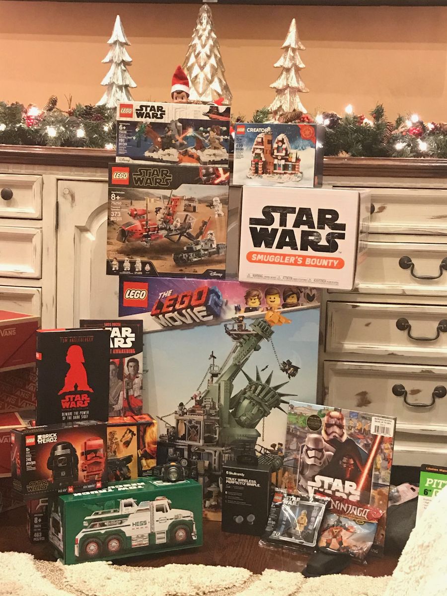 A large haul of LEGO sets stacked up for Christmas