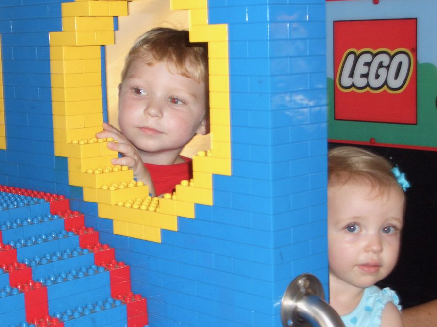 Jackson as a toddler at the LEGO Store with his family